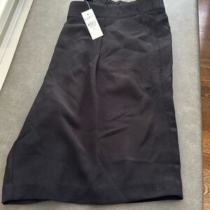 New with tags black polyester shorts